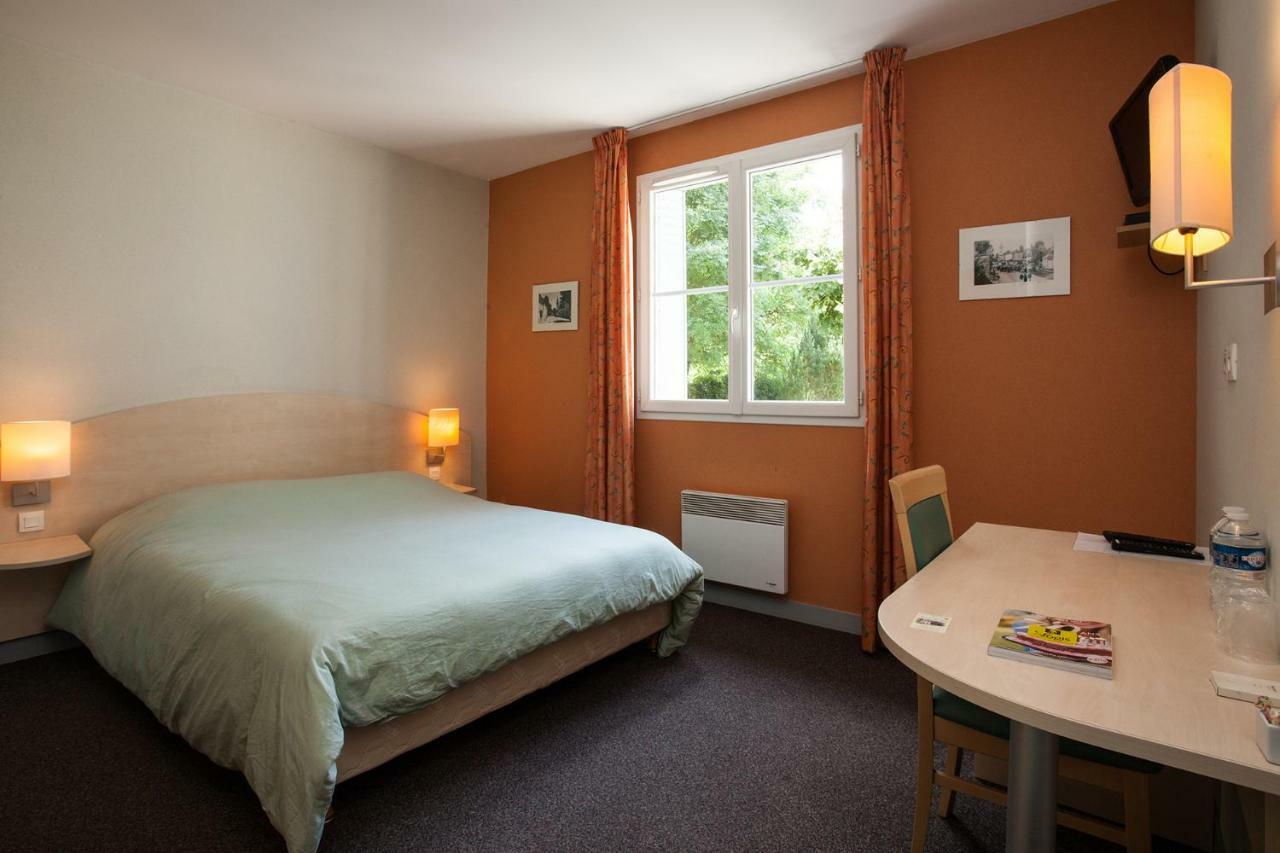 Le Lion D'Or Hotel Manzac-sur-Vern Kültér fotó